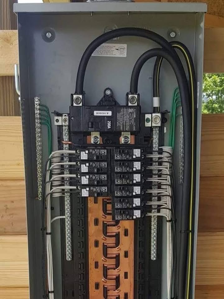 New construction electrical panel rough in on a workshop wall