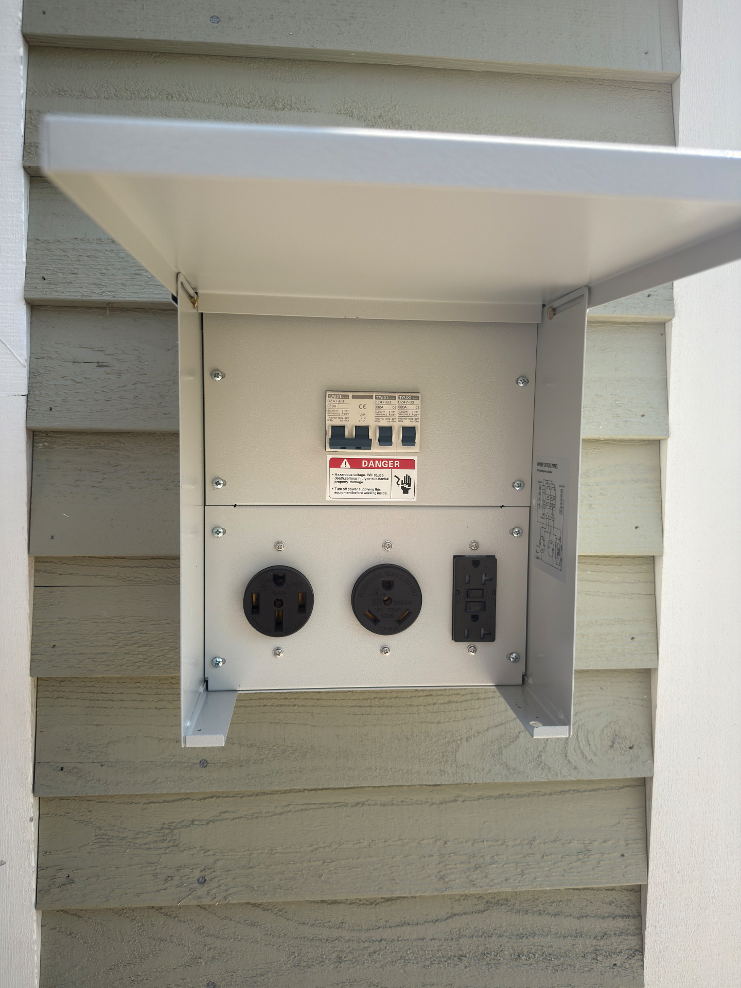 Outdoor RV and EV power panel installed by Trent Electrical