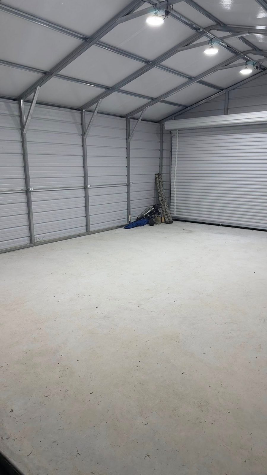 Bright LED ceiling lights in a finished metal garage