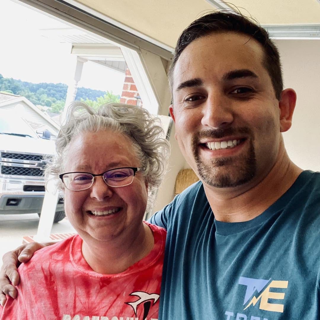 Ryan Trent with a Hawkins County homeowner in her garage