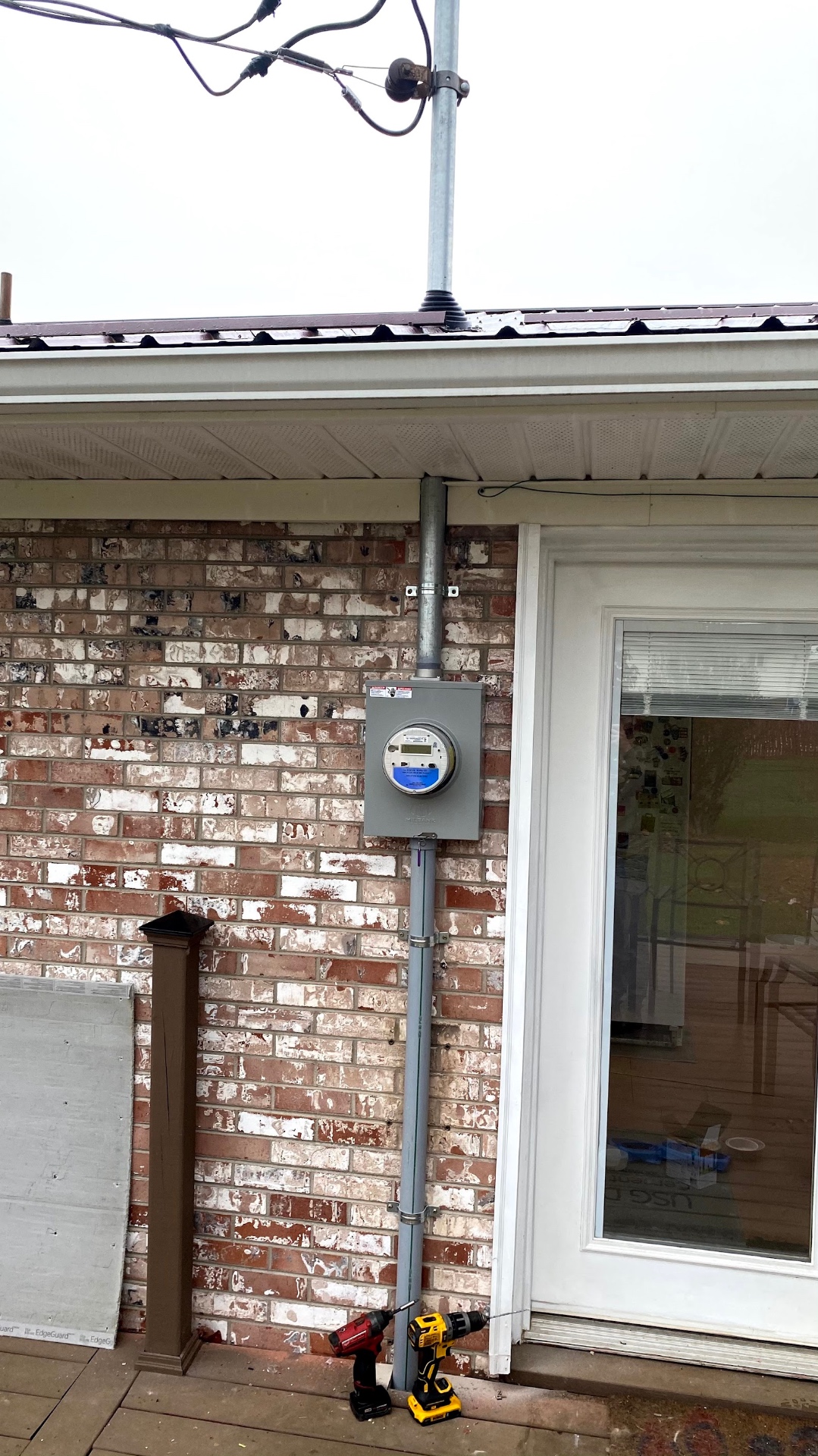 New meter box and conduit installed on a brick home in Kingsport TN