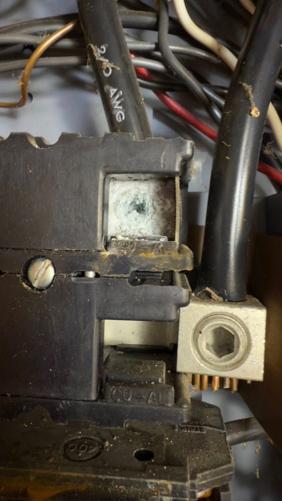 Severely overheated aluminum lug found inside a residential electrical panel in Hawkins County TN
